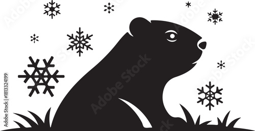 Cute groundhog emerging from snowy ground with falling snowflakes
