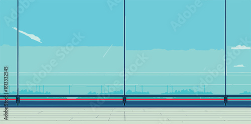 넓은 유리창 너머로 보이는 도시 풍경과 푸른 하늘, 현대적인 건축물의 배경