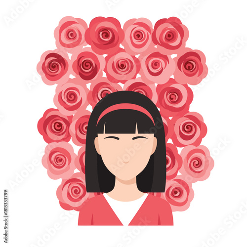 Portrait of a smiling young woman with short black hair standing in front of a beautiful wall covered in pink roses.