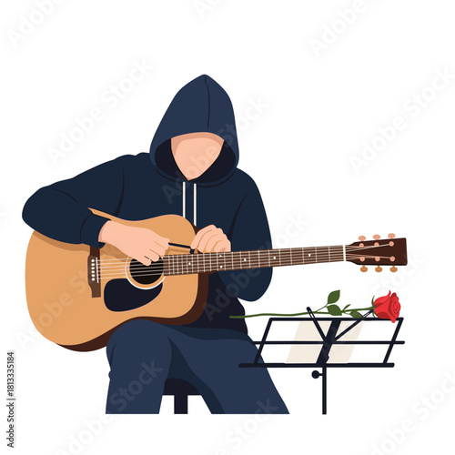 Anonymous musician in a dark hoodie plays a heartfelt song on an acoustic guitar with a single red rose on the music stand.