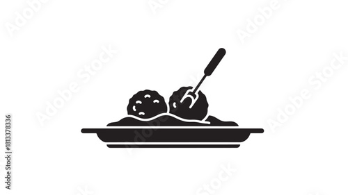 Black Pudding on Plate with Spoon