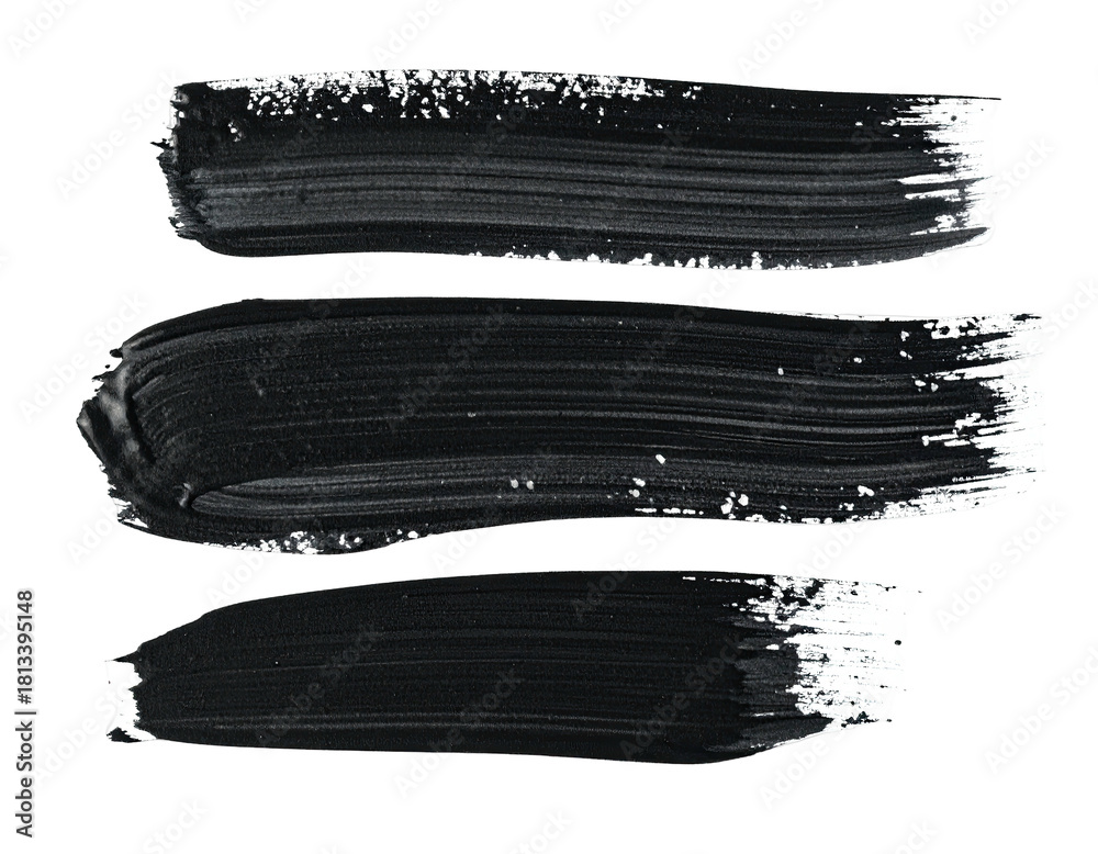 Fototapeta premium Three black paint strokes on a stark, solid background