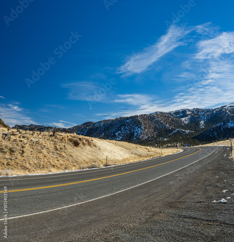 Road Across Valley Floor in Mountains