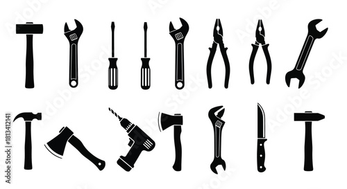 Collection of various black silhouette tools arranged in neat rows