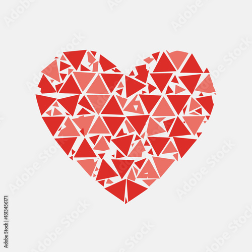 Schilderij op canvas Abstract geometric heart shape composed of various red and pink triangles, symbolizing love and emotion on a clean white background