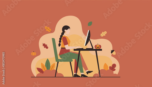 Woman working at computer during autumn season with jackolantern decoration Fall remote work concept