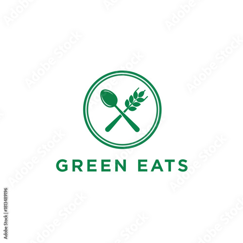 Green Eats logo featuring a spoon and wheat stalk inside a circle.