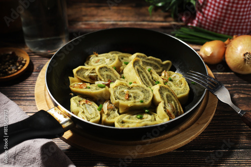 Traditional German Swabian dish maultaschen cut and fried with onion