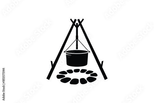 Campfire cooking pot suspended over fire pit