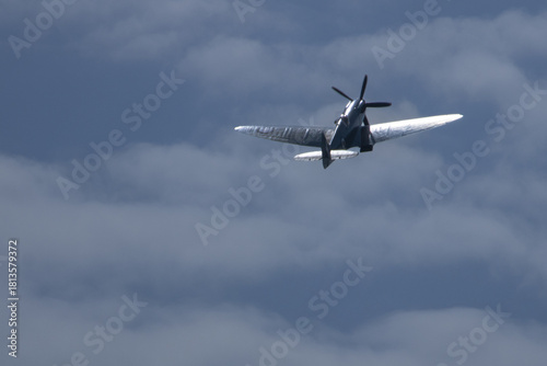 Spitfire plane in flight on sunny day. High quality photo
