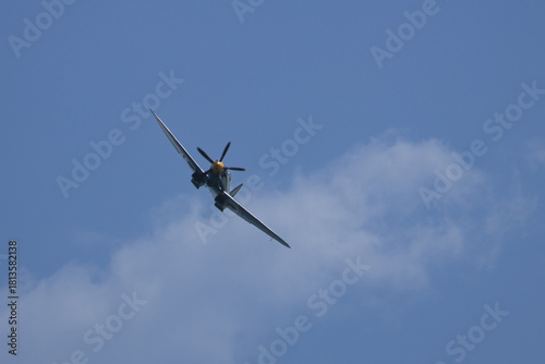 Spitfire plane in flight on sunny day. High quality photo