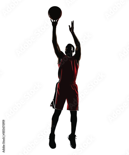 Dynamic silhouette of a basketball player in mid jump shooting the ball silhouette