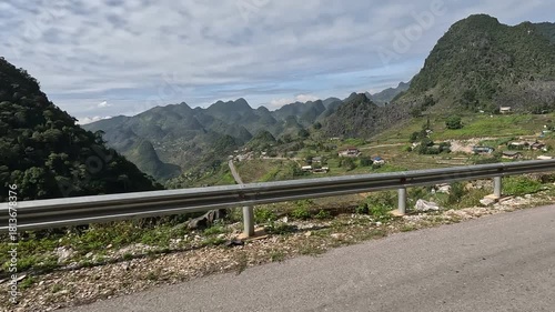 POV motorbike ride on the Ha Giang Loop, Northern Vietnam. Winding roads, misty mountains, and remote villages create an immersive adventure for motorbike and travel lovers.
