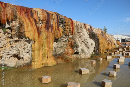 Fototapeta Naklejka Na Ścianę i Meble -  Terme and granite waterfall with geothermal water flowing in Kırşehir, Türkiye