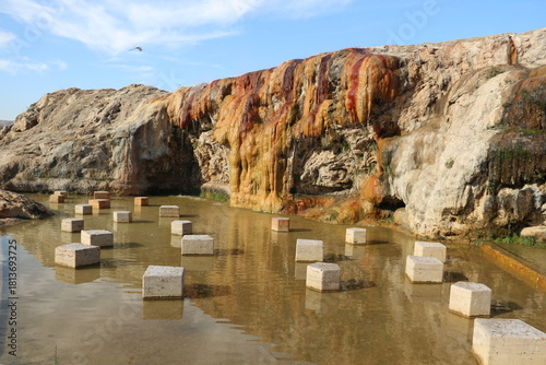 Fototapeta Naklejka Na Ścianę i Meble -  Terme and granite waterfall with geothermal water flowing in Kırşehir, Türkiye