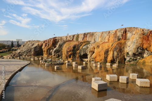 Fototapeta Naklejka Na Ścianę i Meble -  Terme and granite waterfall with geothermal water flowing in Kırşehir, Türkiye