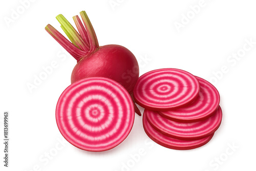 Pink striped candy beets sliced into rounds beside whole beet