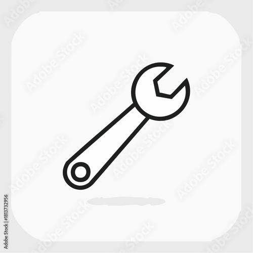 Minimalist line art icon of a combination wrench with a black outline on a light grey background with a subtle shadow