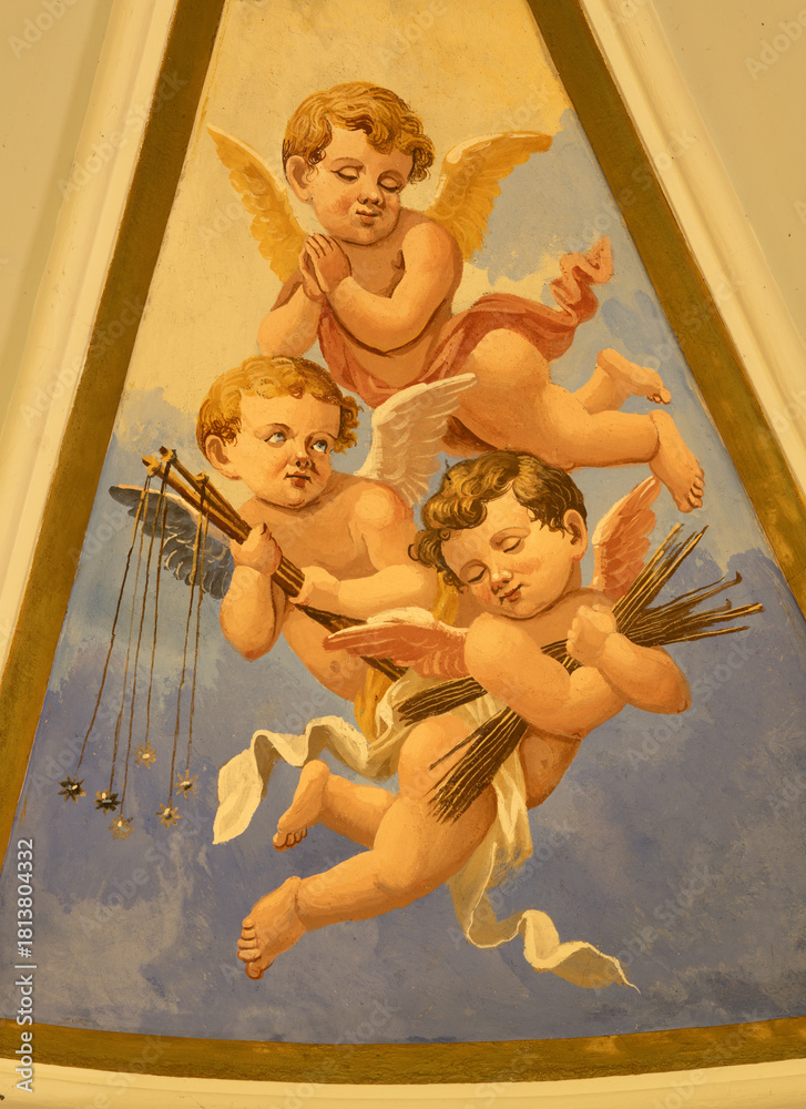 Obraz premium PRAIANO, ITALY - OCTOBER 6, 2025: The fresco of angels with the instruments of crucifixion (hobs) in the side cupola of church Chiesa di san Gennaro by unknown artist of 20. cent. 