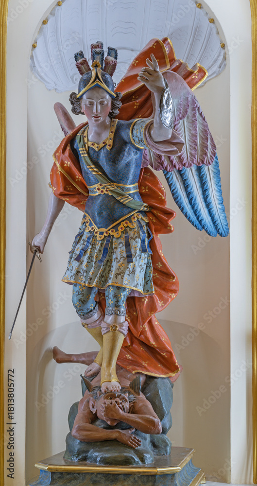 Naklejka premium PRAIANO, ITALY - OCTOBER 6, 2025: The carved polychrome baroque statu of St. Michael Archangel in the church Chiesa di san Gennaro by unknown abaroque artist.