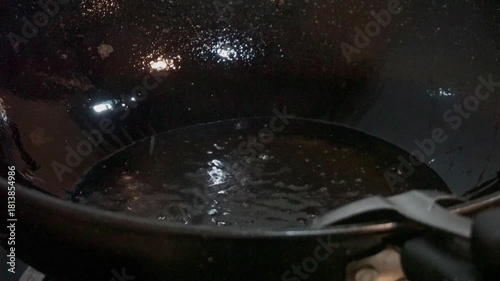 Cooking Oil Bubbling and Smoking in Frying Pan