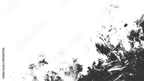 Black ink brush strokes and splatters on white background abstract