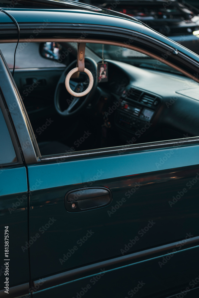 Fototapeta premium Japanese Tsurikawa Subway Ring Hanging in Tuned Car Interior Instead of Passenger Handle 