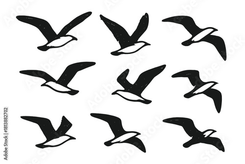 Seamless pattern of flying seagulls in rough hand-drawn brushstroke style