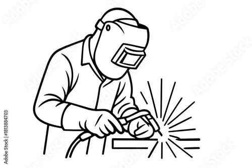 Professional welder wearing a protective mask performing metal work with sparks flying