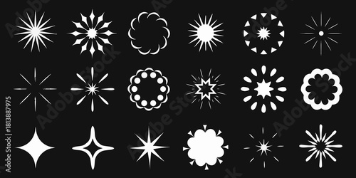 Collection of white starburst and sparkle graphic elements on black background