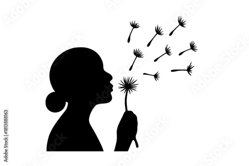 Silhouette profile of a person blowing dandelion seeds into the air making a wish