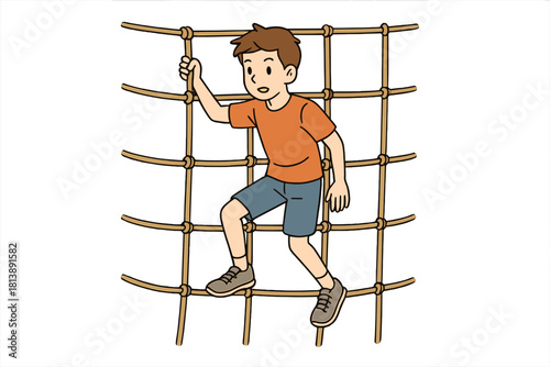 Smiling boy climbing a knotted rope net structure during physical activity