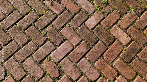 Photography The old red brick paving floor pattern is arranged in a herringbone pattern