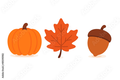 Autumn harvest symbols set featuring a pumpkin, maple leaf, and acorn isolated on white background