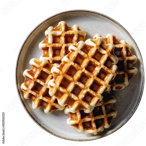 Crispy golden brown waffles stacked on a light gray ceramic plate, presented with soft studio lighting and a clean transparent background, perfect for culinary and breakfast themes
