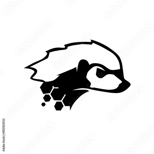 Intense badger head logo with honeycomb graphic elements. A fierce black and white design symbolizing tenacity, intelligence, and natural strength for modern tech or sports branding.