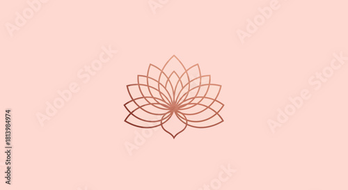 Elegant lotus flower design in rose gold on a peach background.