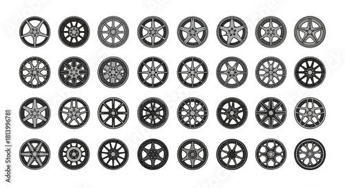 Array of 35 different car rims in shades of gray on a white background