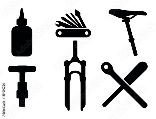 Silhouettes of bicycle repair tools and components on black background