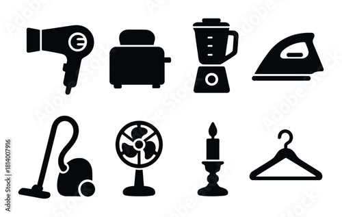 Silhouette icons of household appliances on dark background