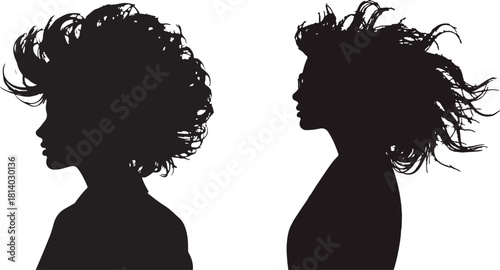 Two Profile Silhouettes of Women with Voluminous Hair