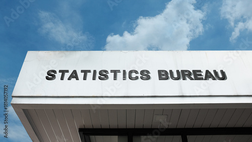Slika na platnu Statistics Bureau word signage on a government or institutional building under a