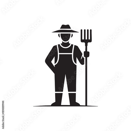 Farmer in overalls and hat holding a pitchfork silhouette
