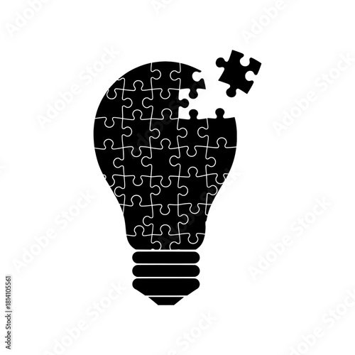 Vector silhouette of a lightbulb jigsaw puzzle with the last piece being put in place, symbolizing innovation, solutions, and creative ideas