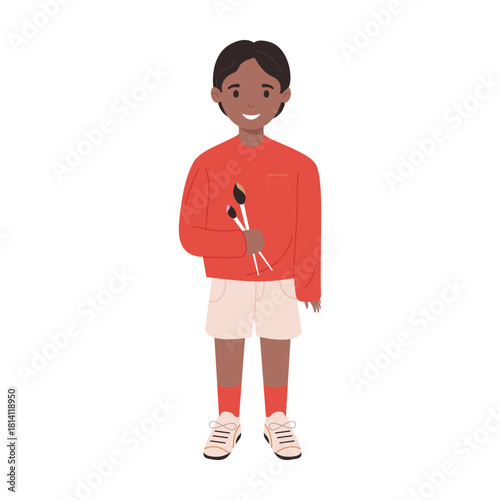 A cheerful young boy adorned in vibrant attire is happily holding a delicious ice cream treat in his hand