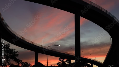 Bangkok-Bhumibol Bridge and King Bridge Building: 2 November 2025,morning and evening atmosphere of colorful sky according to time of day,traffic and people's travel in Yannawa, Rama 3 area,Thailand