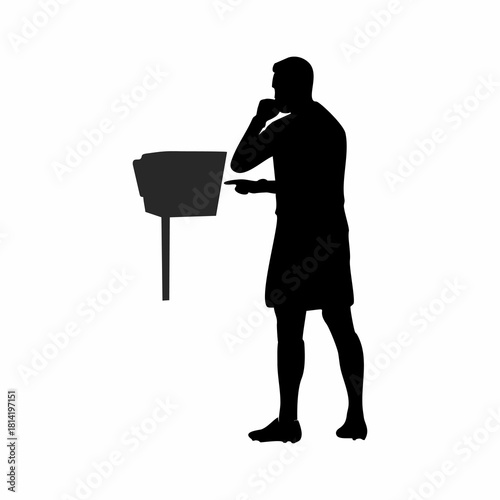 Soccer Referee Using VAR Monitor System for Decision Review Silhouette