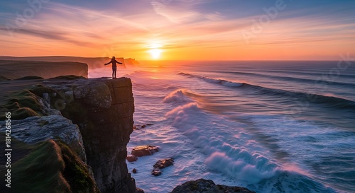 Fototapeta Naklejka Na Ścianę i Meble -  Person arms wide open at ocean sunset