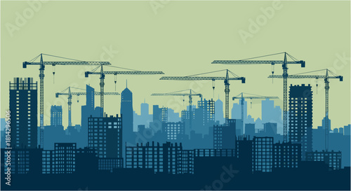Dynamic construction cranes silhouette against a modern city skyline showing urban development project