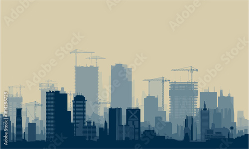 Modern city skyline at dusk with construction cranes creates a dynamic urban cityscape background